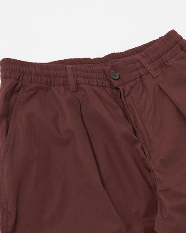 Universal Works Pleated Track Short Peached Poplin Brown
34151B
