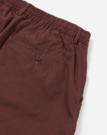 Universal Works Pleated Track Short Peached Poplin Brown
34151B