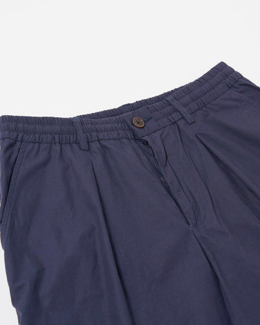 Universal Works Pleated Track Short Peached Poplin Navy
34151N