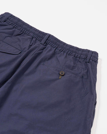 Universal Works Pleated Track Short Peached Poplin Navy
34151N